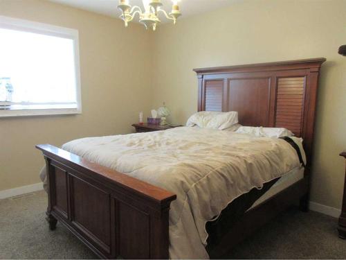 217 Sundance Drive, Coalhurst, AB - Indoor Photo Showing Bedroom