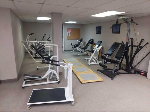 5123 5 Street East, Claresholm, AB - Indoor Photo Showing Gym Room