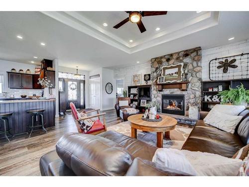 100049 Rng Rd 184, Taber, AB - Indoor Photo Showing Living Room With Fireplace