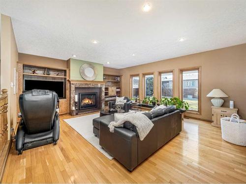 5818 46 Street, Taber, AB - Indoor Photo Showing Living Room With Fireplace
