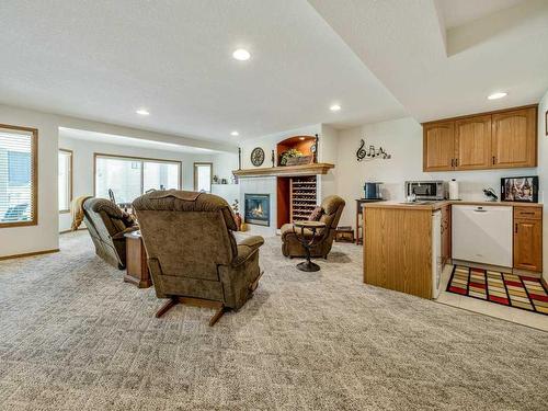 1043 Canyon Boulevard West, Lethbridge, AB - Indoor With Fireplace