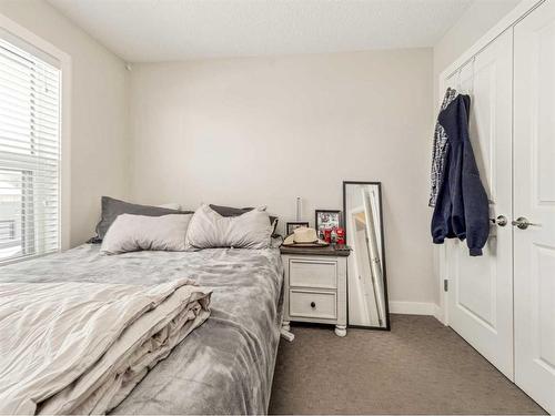2-79 Aquitania Circle West, Lethbridge, AB - Indoor Photo Showing Bedroom