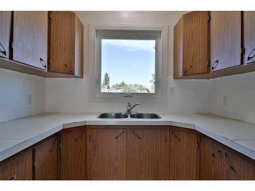 143, 145 7A Avenue West, Cardston, AB - Indoor Photo Showing Kitchen With Double Sink