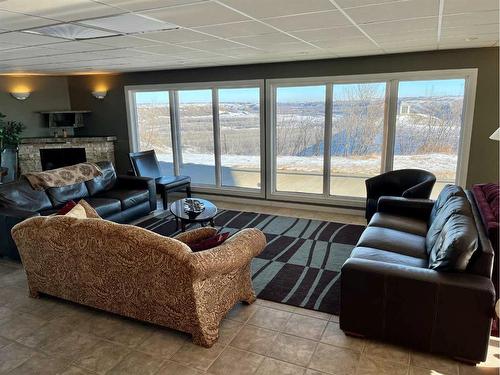 221012 Township 9-2 Road, Rural Lethbridge County, AB - Indoor Photo Showing Living Room With Fireplace