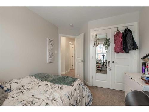 2-73 Aquitania Circle West, Lethbridge, AB - Indoor Photo Showing Bedroom