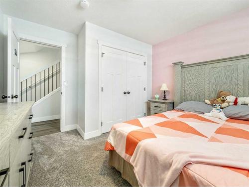 91063 Lucy Street, Rural Lethbridge County, AB - Indoor Photo Showing Bedroom
