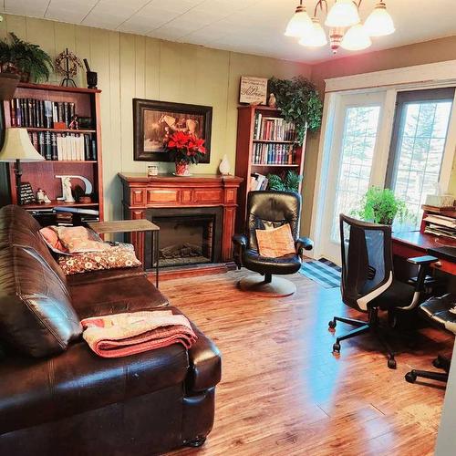 501 Highway, Cardston, AB - Indoor With Fireplace