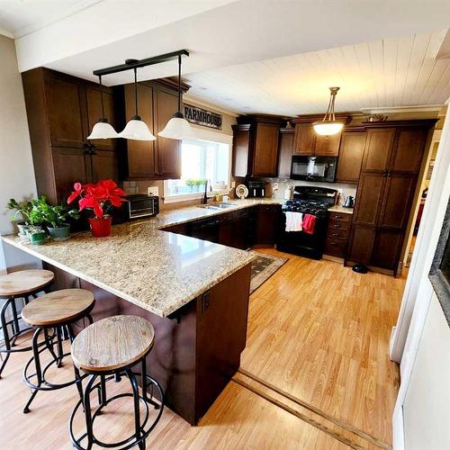 501 Highway, Cardston, AB - Indoor Photo Showing Kitchen With Double Sink