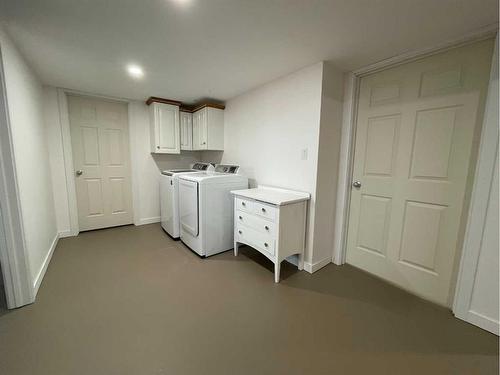 1201 8 Street East, Cardston, AB - Indoor Photo Showing Laundry Room