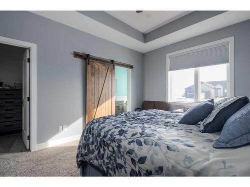 37 Quarry Bank Road, Raymond, AB - Indoor Photo Showing Bedroom