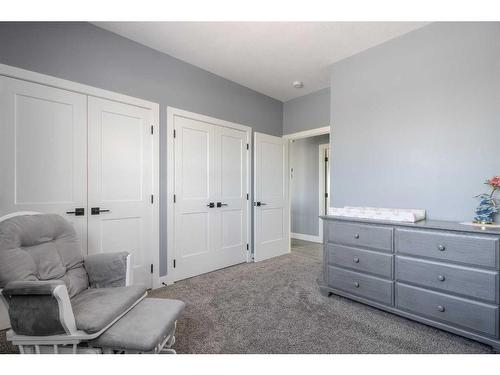 37 Quarry Bank Road, Raymond, AB - Indoor Photo Showing Bedroom