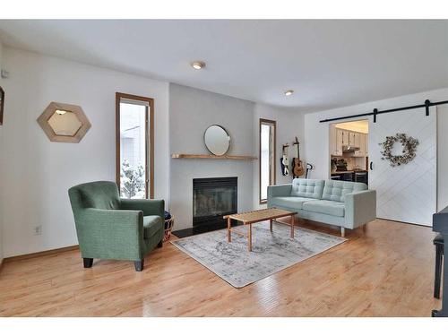 2317 35 Street South, Lethbridge, AB - Indoor Photo Showing Living Room With Fireplace