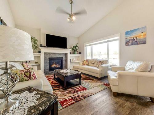 249 Greenwood Road, Coalhurst, AB - Indoor Photo Showing Living Room With Fireplace