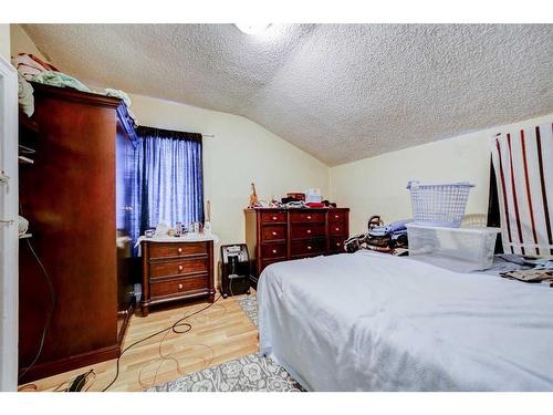 154 4Th Avenue East, Cardston, AB - Indoor Photo Showing Bedroom