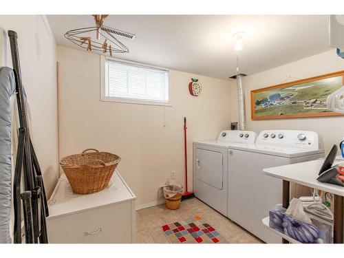 119 Milnes Street, Nobleford, AB - Indoor Photo Showing Laundry Room