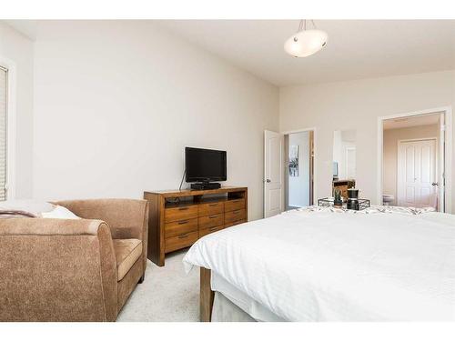 68 Canyoncrest Point West, Lethbridge, AB - Indoor Photo Showing Bedroom