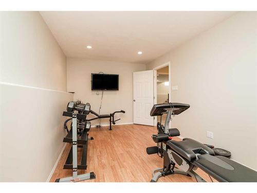 68 Canyoncrest Point West, Lethbridge, AB - Indoor Photo Showing Gym Room