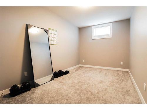 50 Stonegate Village East, Raymond, AB - Indoor Photo Showing Other Room