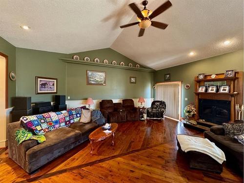 282041 Twp Rd 113, Claresholm, AB - Indoor Photo Showing Living Room With Fireplace