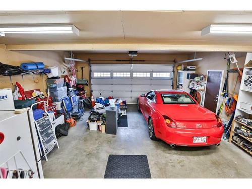 297 Coachwood Point West, Lethbridge, AB - Indoor Photo Showing Garage