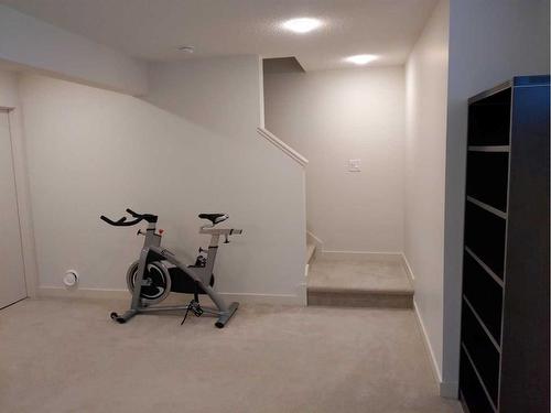 2102-100 Walgrove Court Se, Calgary, AB - Indoor Photo Showing Gym Room