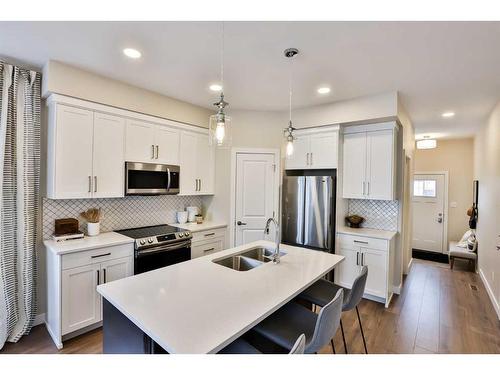 2-6 Riverford Close West, Lethbridge, AB - Indoor Photo Showing Kitchen With Double Sink With Upgraded Kitchen