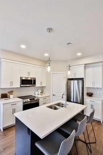 2-6 Riverford Close West, Lethbridge, AB - Indoor Photo Showing Kitchen With Double Sink With Upgraded Kitchen