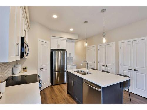 2-6 Riverford Close West, Lethbridge, AB - Indoor Photo Showing Kitchen With Double Sink With Upgraded Kitchen