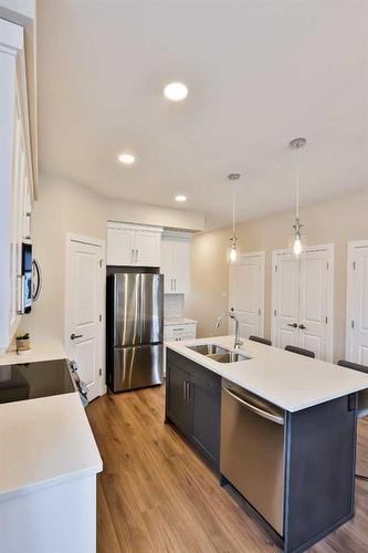 2-6 Riverford Close West, Lethbridge, AB - Indoor Photo Showing Kitchen With Double Sink