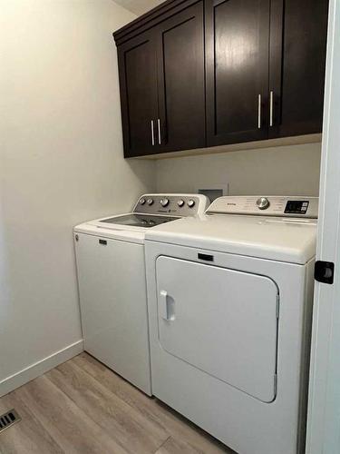 338W 100 North, Raymond, AB - Indoor Photo Showing Laundry Room