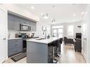4-73 Aquitania Circle West, Lethbridge, AB  - Indoor Photo Showing Kitchen With Upgraded Kitchen 