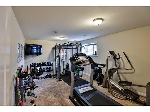 35 Church Avenue, Raymond, AB - Indoor Photo Showing Gym Room
