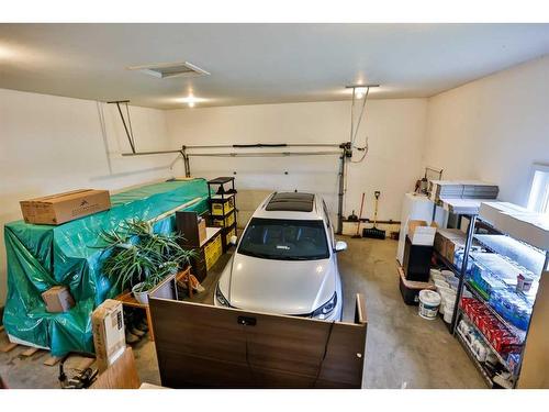35 Church Avenue, Raymond, AB - Indoor Photo Showing Garage