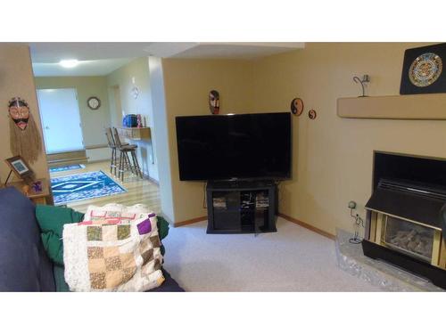 214 21 Street, Fort Macleod, AB - Indoor Photo Showing Other Room With Fireplace