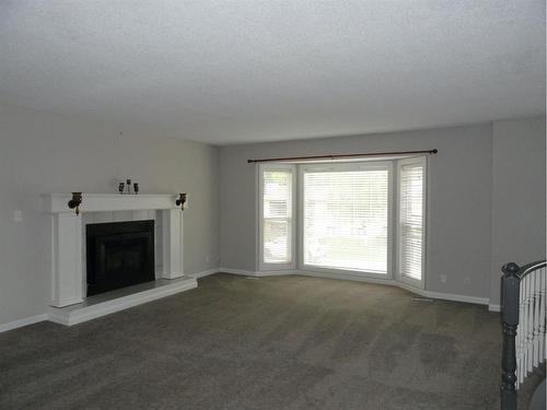 11437 19 Avenue, Blairmore, AB - Indoor With Fireplace