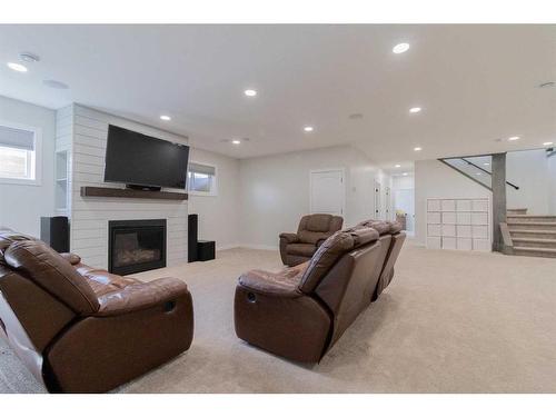 242 4A Street, Stirling, AB - Indoor With Fireplace