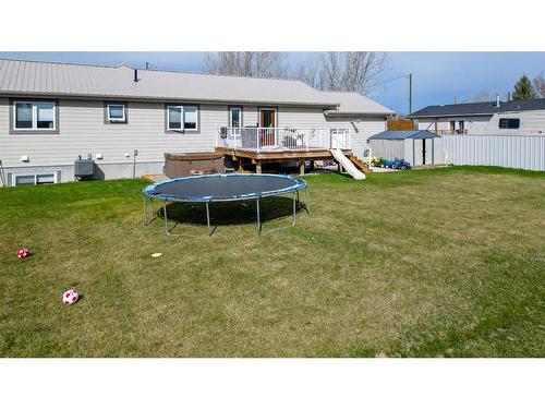 242 4A Street, Stirling, AB - Outdoor With Deck Patio Veranda With Backyard