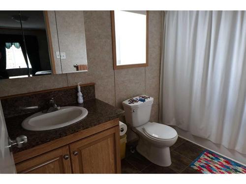 720 2 Street North, Grassy Lake, AB - Indoor Photo Showing Bathroom
