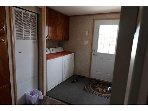 720 2 Street North, Grassy Lake, AB - Indoor Photo Showing Laundry Room