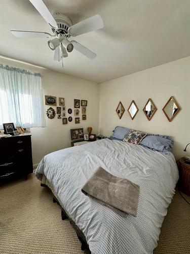 521 52 Avenue, Coalhurst, AB - Indoor Photo Showing Bedroom