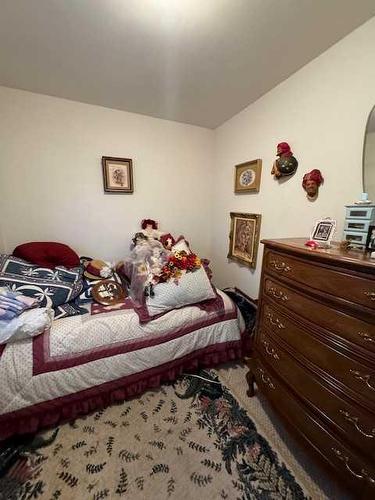 521 52 Avenue, Coalhurst, AB - Indoor Photo Showing Bedroom