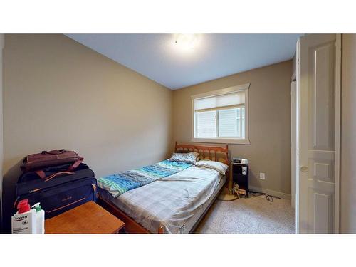 2-3918 Sundance Road South, Coalhurst, AB - Indoor Photo Showing Bedroom