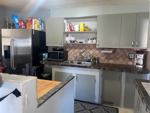 116S 1 Street West, Magrath, AB - Indoor Photo Showing Kitchen With Double Sink