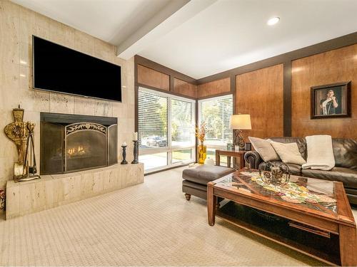 3101 Parkside Drive South, Lethbridge, AB - Indoor Photo Showing Living Room With Fireplace