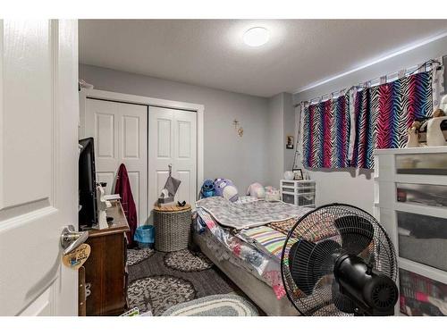 63 Lasalles Road West, Lethbridge, AB - Indoor Photo Showing Bedroom