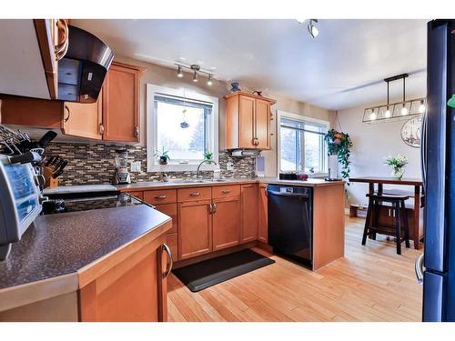 1010 13 Street South, Lethbridge, AB - Indoor Photo Showing Kitchen With Double Sink