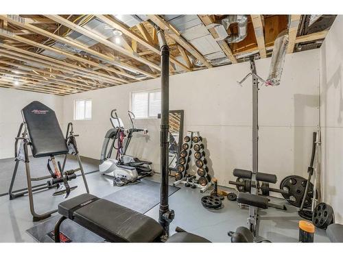 150 Prairie Gold St, Taber, AB - Indoor Photo Showing Gym Room