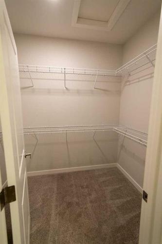 103-1940 Parkside Way, Coaldale, AB - Indoor With Storage