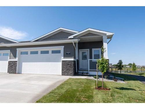 103-1940 Parkside Way, Coaldale, AB - Outdoor With Facade