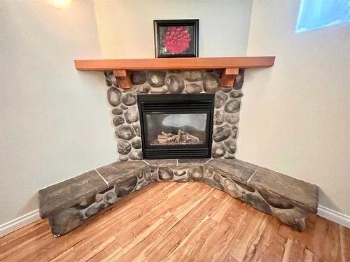 916 Mayor Magrath Drive South, Lethbridge, AB - Indoor Photo Showing Living Room With Fireplace